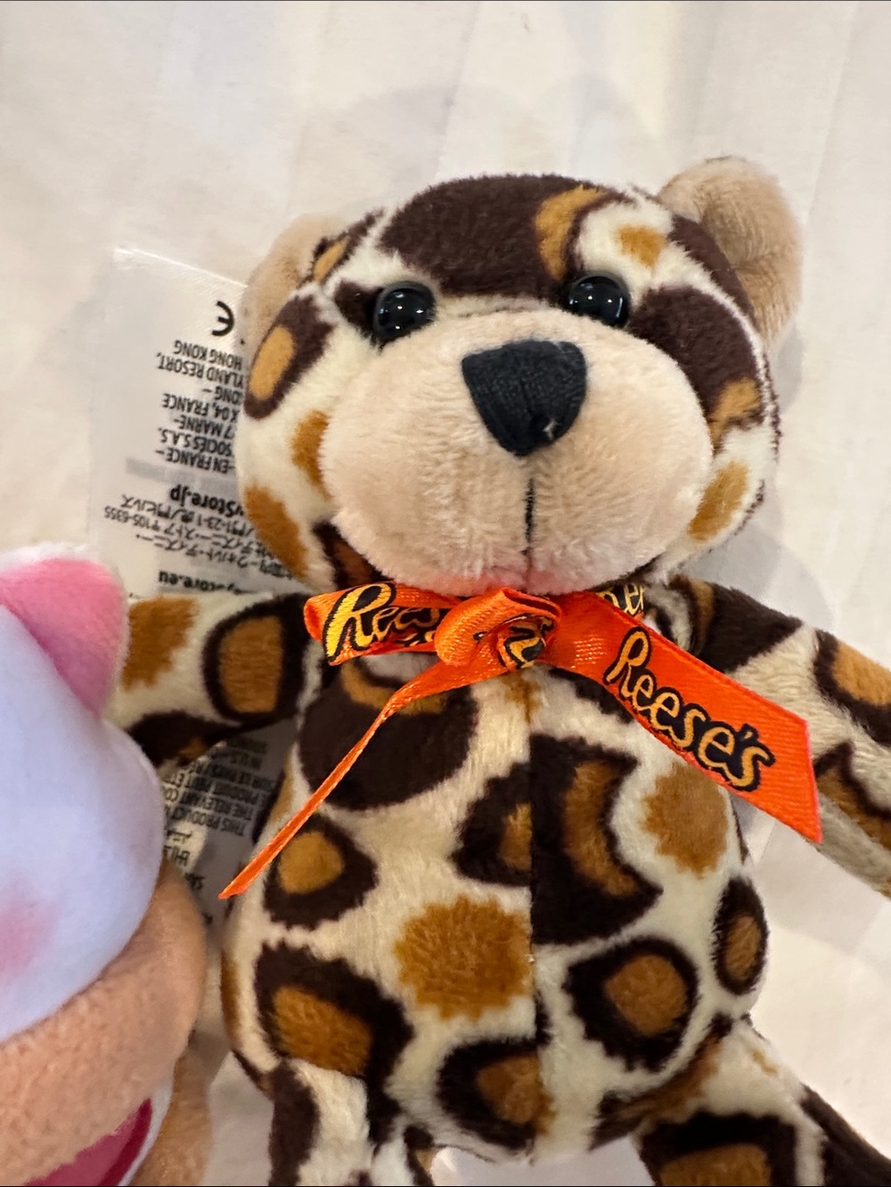 Disney strawberry shortcake, stuffed plushy and Reese’s pieces leopard plushy - Picture 3 of 9